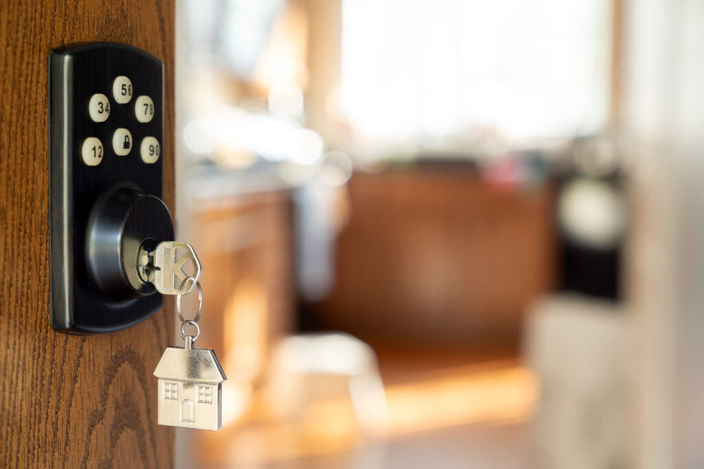 Residential smart lock keypad with key with house shape